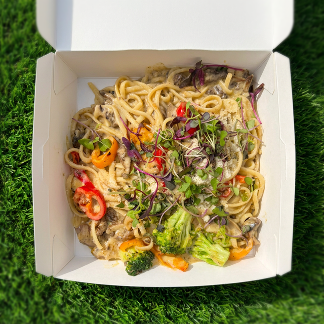 Jerk Rasta Pasta w/ Garlic Bread.